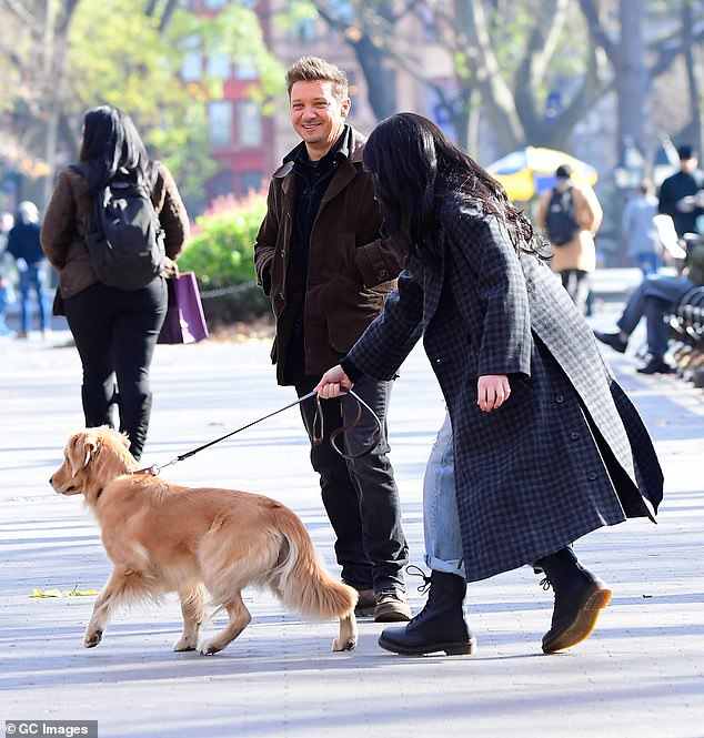 Off they go: Jeremy cut a stylish figure in a sleek brown leather jacket over a black top, whilst Hailee threw an oversize blue coat on top of a T-shirt and jeans