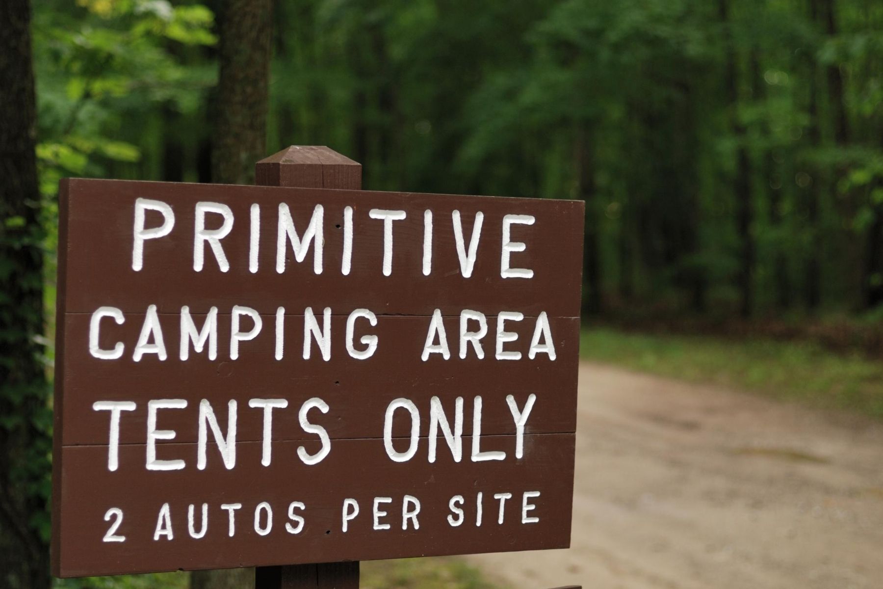 primitive camping sign