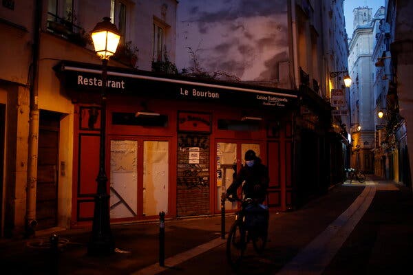 A shuttered restaurant in Paris in November. The French government will pay for up to 10 days of vacation leave for every furloughed employee of restaurants, bars, hotels and sports centers that have been forced to remain closed under France’s latest lockdown.