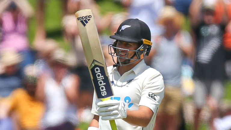 New Zealand's Neil Wagner raises his bat after scoring his maiden Test half-century against West Indies at Wellington