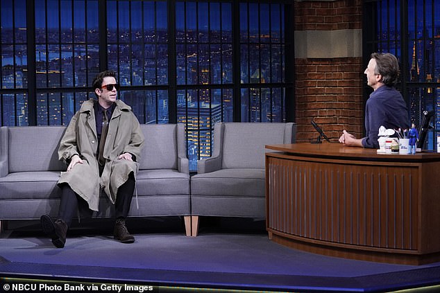 Odd appearance: Mulaney was dressed in a duster and large sunglasses in a rambling segment about royal family gossip that was filmed in early November