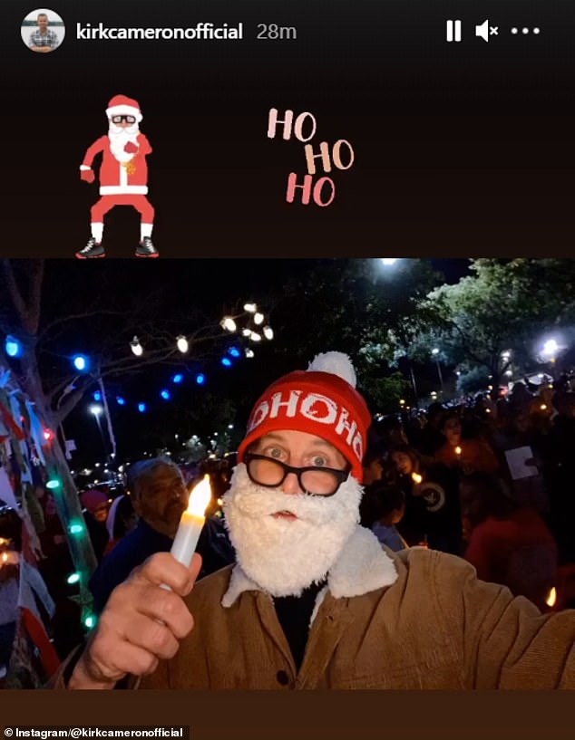 Cameron wore a Santa Claus beard during the mask-free Christmas carols protest