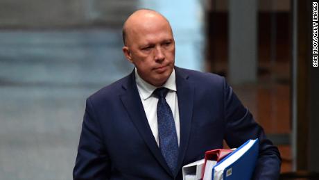 Australia&#39;s Home Affairs minister Peter Dutton was threatened with contempt of court over a visa case.