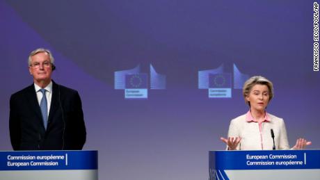 European Commission President Ursula von der Leyen, right, and European Commission&#39;s Head of Task Force for Relations with the UK Michel Barnier speak after the deal was agreed in Brussels on Thursday.