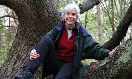 Author Michelle Paver, tree climbing in Wimbledon Common woods