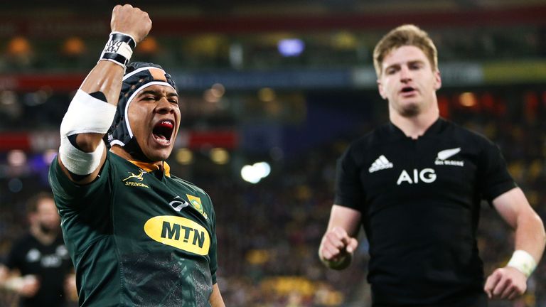 Cheslin Kolbe celebrates after scoring a try against the All Blacks in Wellington