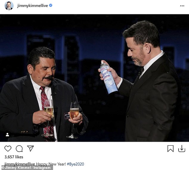 Sums it up: Late night host Jimmy Kimmel shared a photo of himself and his ABC show sidekick Guillermo. Guillermo holds two glasses of champagne while Jimmy holds a spray can of Lysol