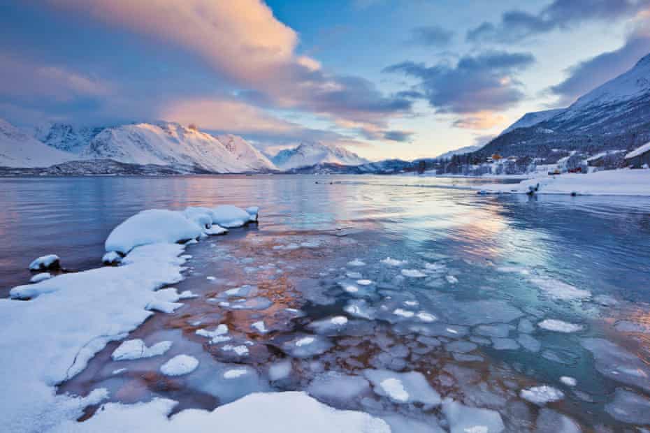 Looking across the frozen sea of Ullsfjord towards the Southern Lyngen Alps.