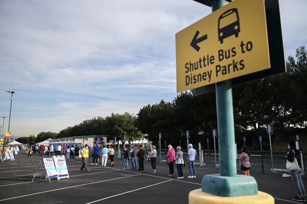 A Disneyland parking lot was used as a vaccination site on Wednesday. The resort has been closed for 10 months because of the pandemic.