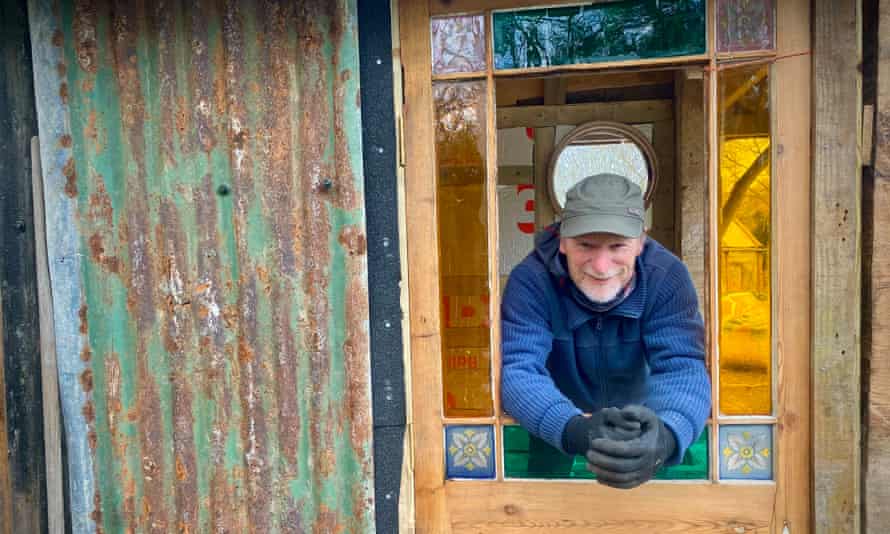 Taking shape … ‘scrounging has resulted in a fine Victorian glass door’ for the author’s hut