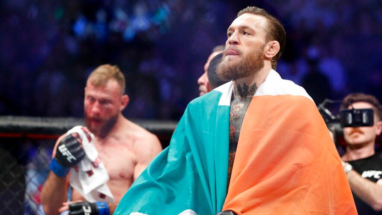 AP - Conor McGregor celebrates after defeating Donald &#34;Cowboy&#34; Cerrone during a UFC 246 welterweight mixed martial arts bout