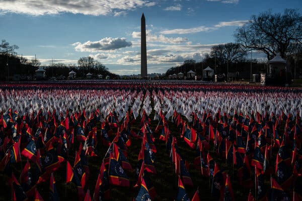 A field of flags from U.S. states planted on the National Mall on Monday to represent the thousands of Americans who would normally attend the inauguration.