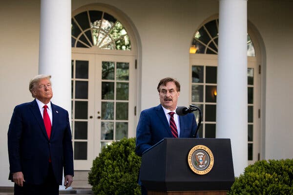 Mike Lindell, the chief executive of MyPillow, with President Trump at a White House briefing in March.