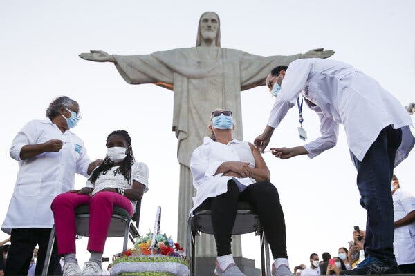 Women receiving the Sinovac Covid-19 vaccine at the Christ the Redeemer statue in Rio de Janeiro on Monday.