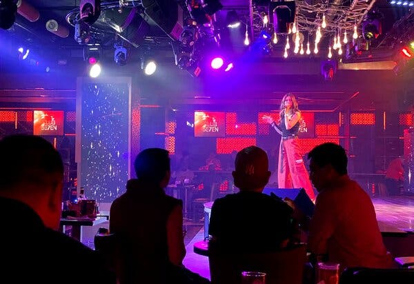 A singer performing in a nightclub in Dubai in November. Dubai has been hesitant to shut down its entertainment sector but is finally enacting restrictions amid a rise in coronavirus cases.