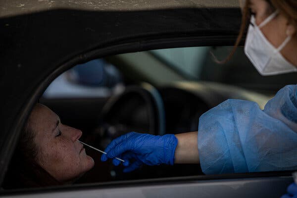 A coronavirus testing site in Somerton, Ariz., this month. Doctors are trying to understand why some people who contracted the virus continue to experience symptoms long after they have gotten better.