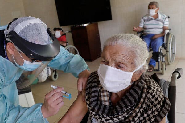 Francisca Alves Xavier, 102, receiving China’s Sinovac vaccine in Brasília last week.