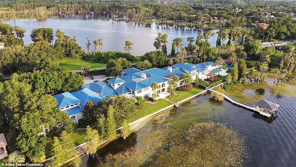 All washed up: His mansion is a paradise for anyone who wants to be close to the water, as its surrounded by both Lake Butler and Lake Louise