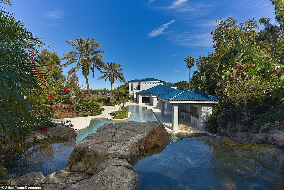 Entertaining: Guests and residents can enjoy the warm evenings with a kitchen near the pool that's ideal for entertaining