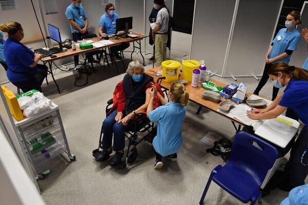 A patient receiving an injection of the AstraZeneca-Oxford vaccine on Tuesday in Brighton, Britain.