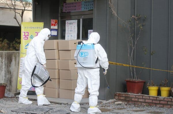 Disinfecting a missionary training school in Gwangju, South Korea, on Wednesday. Religious groups in South Korea have driven several coronavirus outbreaks.