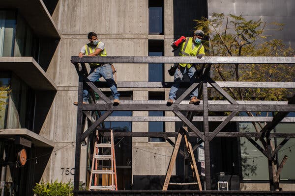 An outdoor dining area under construction at a San Diego restaurant after California relaxed restrictions on gathering in the latest phase of the pandemic.