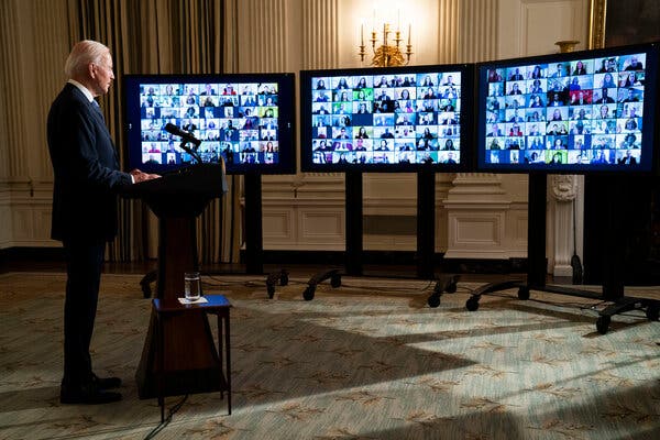 President Biden swore in members of the White House staff remotely on Jan. 20.