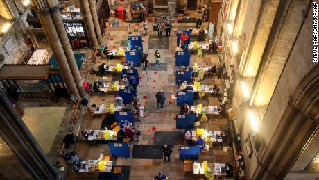 Covid-19 vaccines are given with organ music at UK&#39;s historic Salisbury Cathedral 