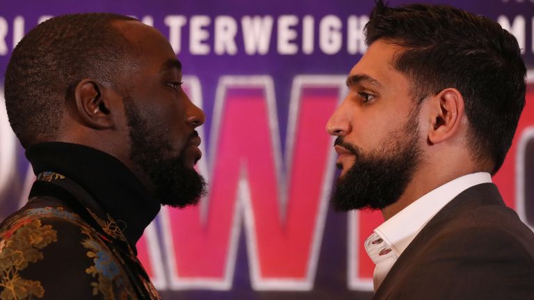 Crawford stopped Khan