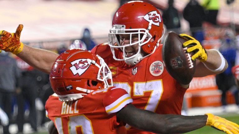 Kansas City tight end Travis Kelce celebrates with teammate Tyreek Hill after catching one of his two touchdown passes