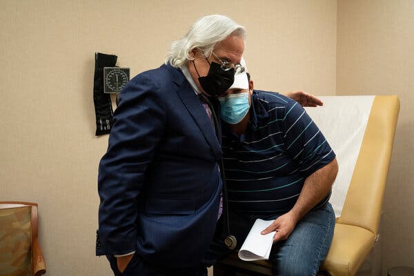 Dr. Ricardo Cigarroa hugging a patient at the Laredo Medical Center in Laredo, Texas.