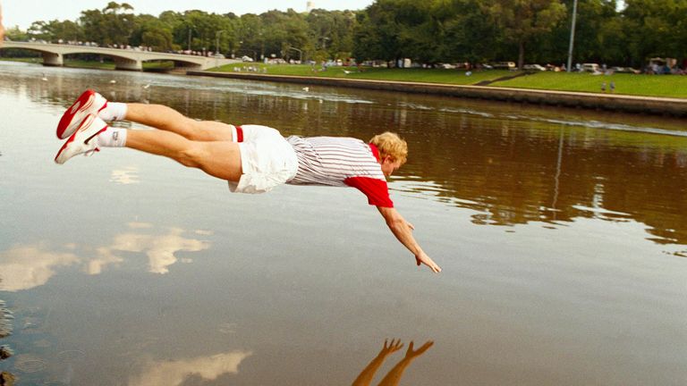 Jim Courier dives in the Yarra River after winning the title in 1993