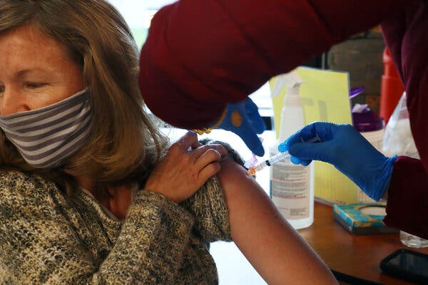 Mary Freeman, a preschool teacher, receiving an injection of the Moderna vaccine in Mountain View, Calif., on Jan. 22.