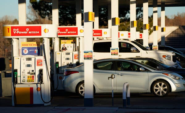 A Shell station in Lone Tree, Colo. Despite a big fall in profit, Royal Dutch Shell said Thursday it would increase its dividend.