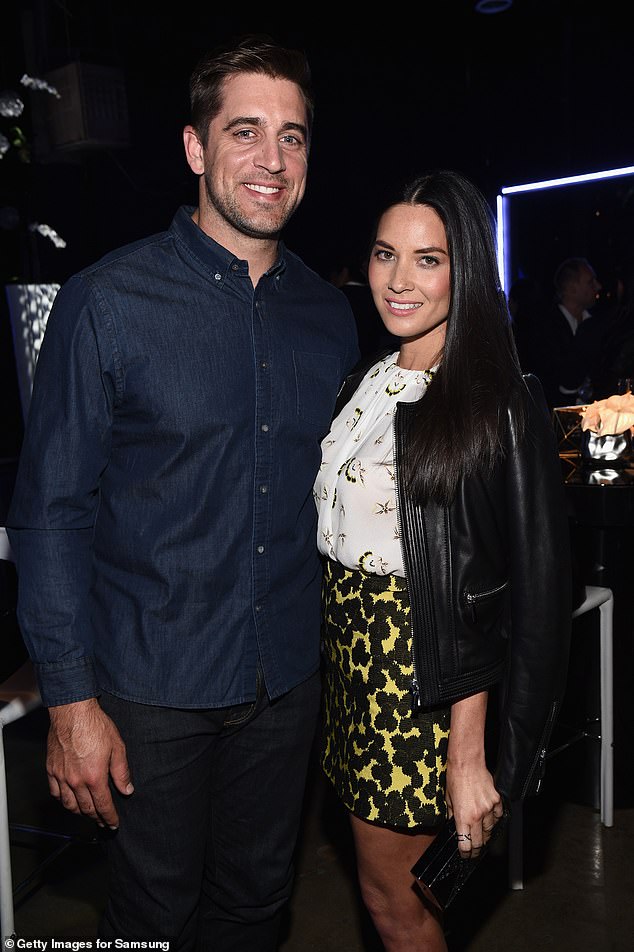 Three year romance: Aaron also famously dated actress Olivia Munn from 2014 until their 'amicable' split in 2017; Aaron and Olivia pictured in 2015