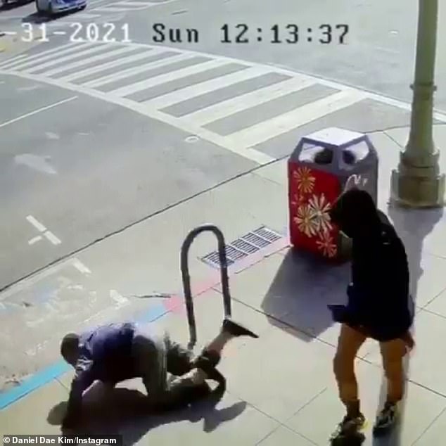 Disturbing: The attack, which was captured on camera and occurred in the Chinatown district of Oakland, California, showed an unidentified person shoving a 91-year-old to the ground outside the Asian Resource Center on January 31, according to People