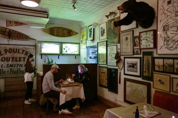 Customers dining inside Fairfax, a restaurant in the West Village in Manhattan, in December.