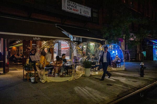 Dining in plastic igloos outside an East Village restaurant in Manhattan in November. Indoor dining has been banned in New York City since mid-December.