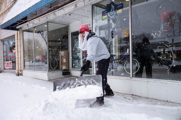 The winter storm that battered the Midwest left businesses digging out from under piles of snow on Tuesday.