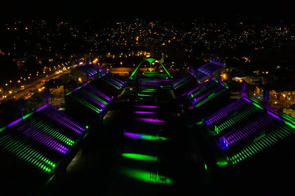 The Sambódromo in Rio de Janiero, normally the site of carnival parades, was lit on Friday in honor of victims of Covid.