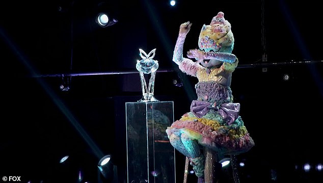 Coveted trophy: Cotton Candy rejoiced as it was announced she won the coveted Diamond Mask Trophy