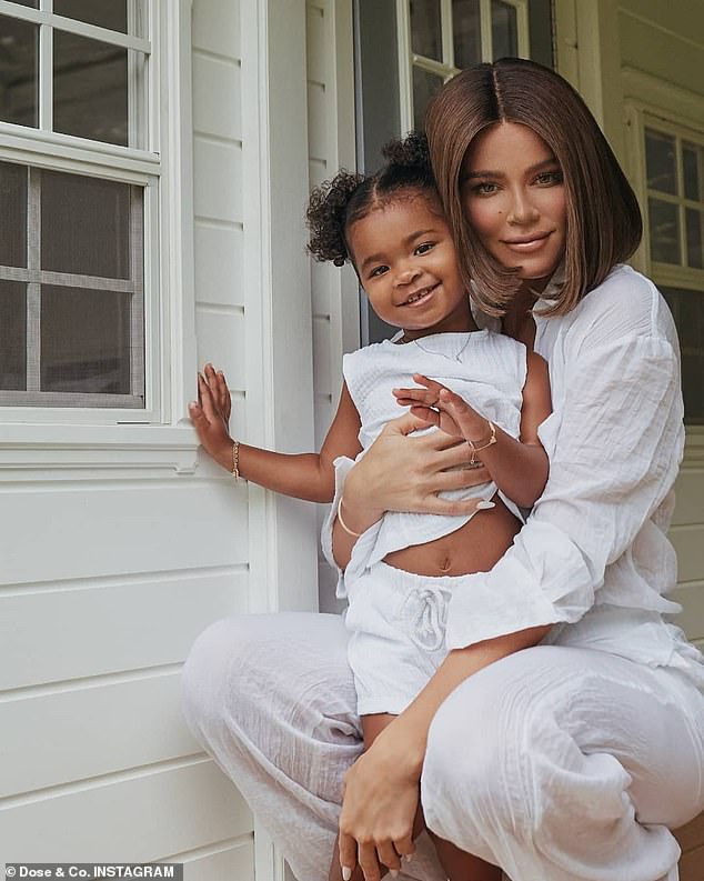 Cuties: Khloe pictured with her and Tristan's daughter True