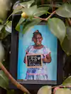 Kimmie's most recent school picture sits in a tree outside her home in Hawthorne, Fla. (Nydia Blas for The Washington Post)