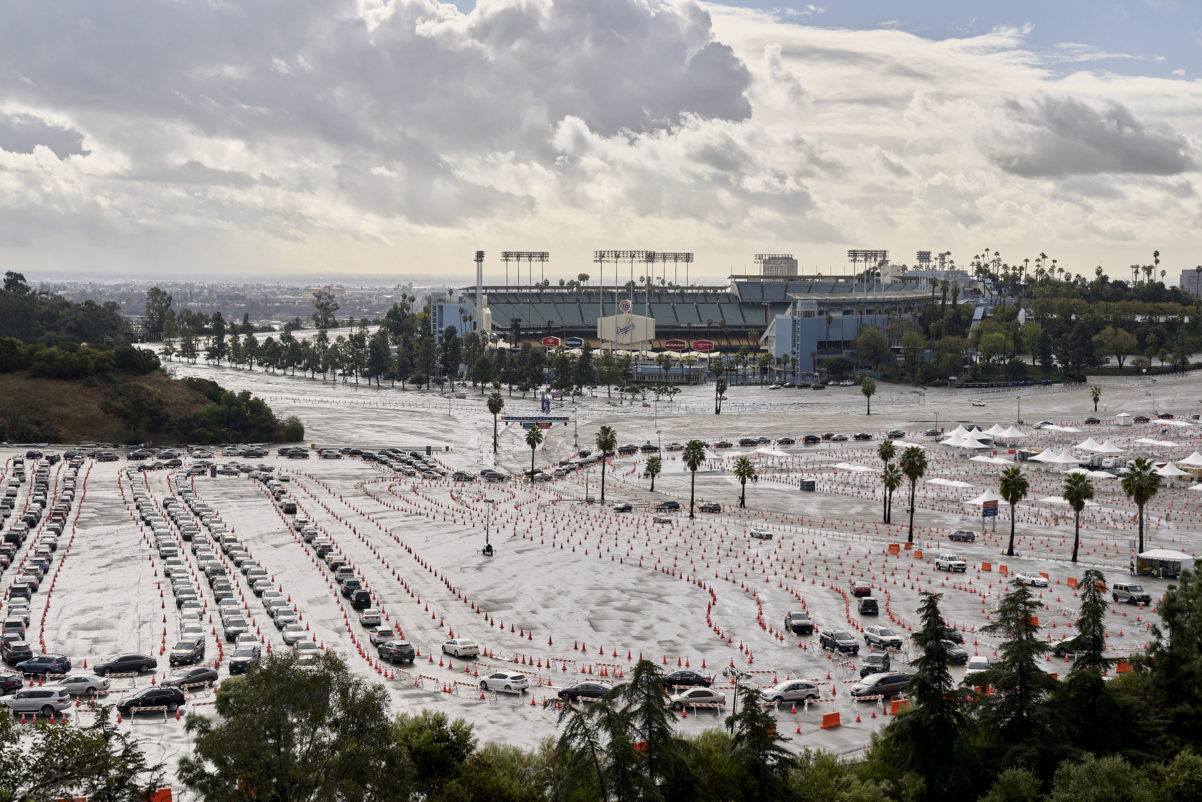 Cars lined up ata vaccination site at Dodger Stadium in Los Angeles on Jan. 29, 2021.