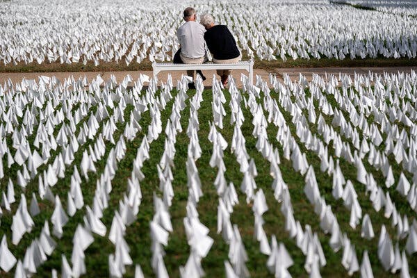 Parade grounds in Washington in October, with white flags representing the number of people who have died from Covid-19 in the United States.