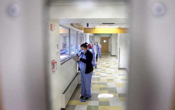 Frontline medical workers waiting for vaccination at the Virginia Hospital Center in Arlington on Dec. 16. The state had a surge in Covid-19 cases during and after the holidays. 