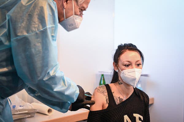 A nurse receiving the AstraZeneca coronavirus vaccine at the vaccination center in Rostock, Germany, this month.