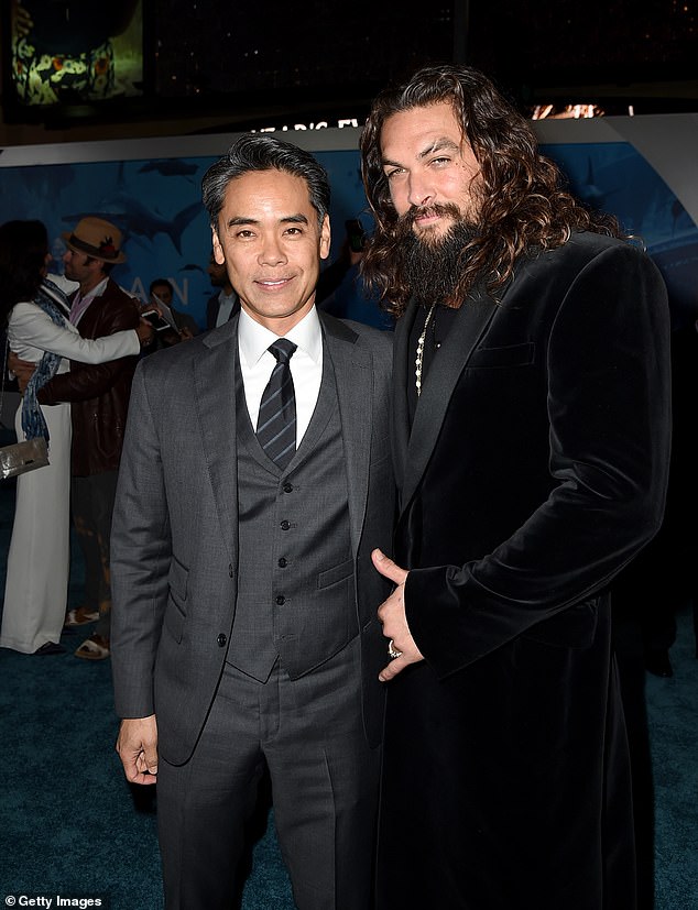 The boss: He claimed Hamada had tried to interfere with the investigation, though he claimed he had somehow prevented that; Hamada (L) seen with Jason Momoa in Hollywood in 2018