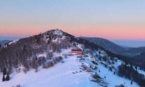 Zavižan mountain hut at sunset in clearer conditions.