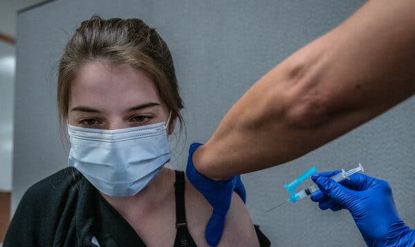 Alyssa Jost, 19, received her second dose of the Moderna vaccine at Cobre Valley Regional Medical Center in Gila County, Ariz.